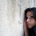 anxious hispanic woman