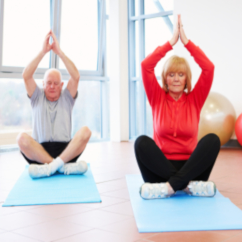 Seniors doing yoga